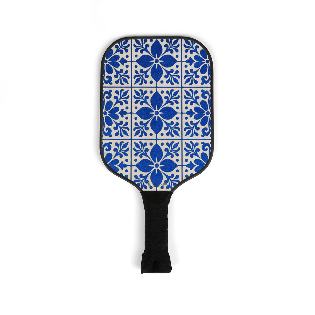 Pickleball paddle with blue floral pattern on a white background