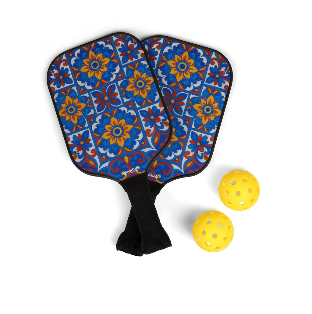 Colorful pickleball paddles with two balls featuring a vibrant floral design.