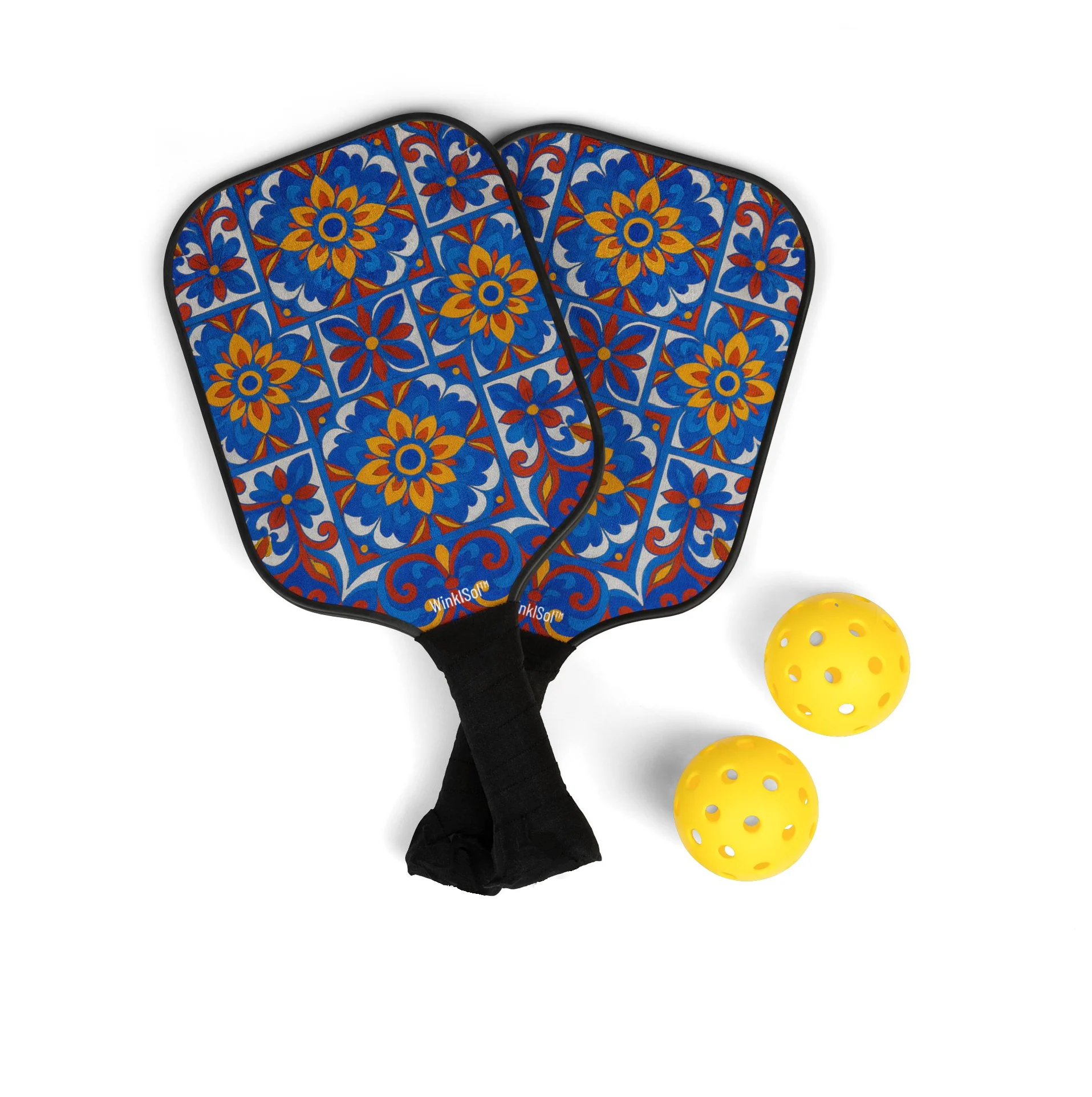 Colorful pickleball paddles with two balls featuring a vibrant floral design.